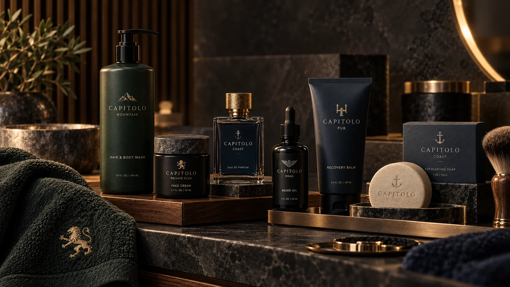 The CAPITOLO personal care collection arranged on dark stone and warm wood.